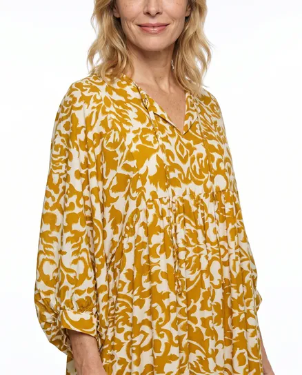 Kleid mit Muster in camel von H. Trend